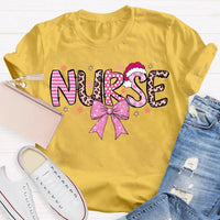 Nurse Christmas Shirt, School Nurse Santa Hat Pink Bow Shirt, Festive Holiday Medical Tee, Adorable Coquette Nurse Graphic Shirt