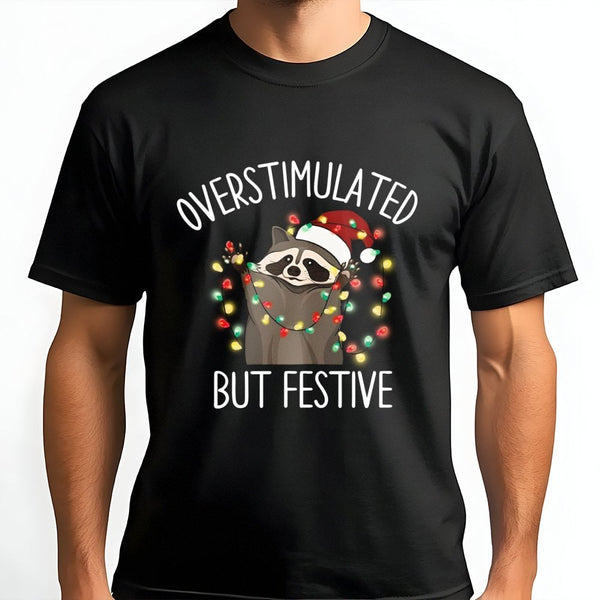 Humorous Holiday Animal Graphic Tee, Overstimulated but Festive Raccoon T-Shirt, Adorable Christmas Trash Panda Shirt, Introv