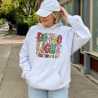 Christmas Lights Faith Sweatshirt, Be the Light Matthew 5:14 Hoodie, Christian Bible Verse Graphic Hoodie, Holiday Hooded Sweatshirt Present