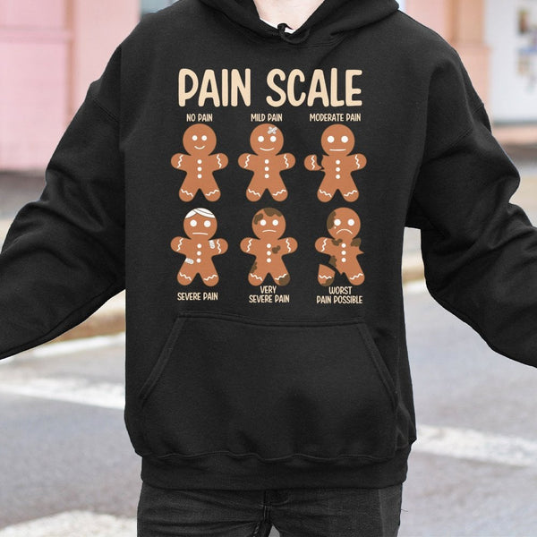 Humorous Christmas Nurse Hooded Sweatshirt, Pain Scale Gingerbread Nurse Hoodie, Holiday Healthcare Worker Sweater, Xmas Nurs