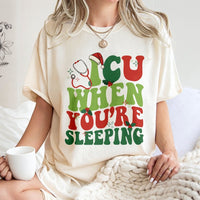 Humorous Nurse Holiday Tee, ICU When You're Sleeping Christmas T-Shirt, Medical Stethoscope Xmas Graphic Shirt, Healthcare Doctor Winter Top