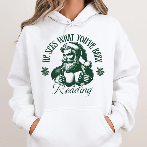Humorous Santa Book Lover Sweatshirt, He Sees What You've Been Reading Hoodie, Christmas Librarian Hooded Sweater
