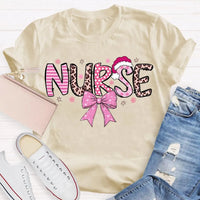 Nurse Christmas Shirt, School Nurse Santa Hat Pink Bow Shirt, Festive Holiday Medical Tee, Adorable Coquette Nurse Graphic Shirt