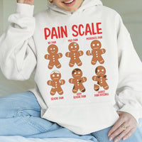 Humorous Christmas Nurse Hooded Sweatshirt, Pain Scale Gingerbread Nurse Hoodie, Holiday Healthcare Worker Sweater, Xmas Nurse Present
