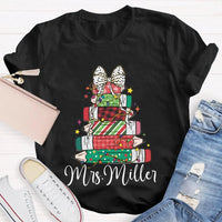 Colorful Crayons Bows Holiday Shirt, Personalized Christmas T-Shirt, Custom Name Kids Xmas Graphic Tee, Festive School Party Shirt