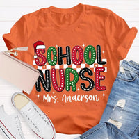 Custom Name Santa Hat Graphic Tee, Personalized School Nurse Christmas Shirt, RN Nurse Holiday T-Shirt, Healthcare Staff Xmas Present