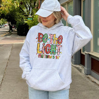 Christian Christmas Lights Hooded Sweatshirt, Be the Light Matthew 5:14 Hoodie, Faith Scripture Pullover, Religious Holiday Present Hoodie