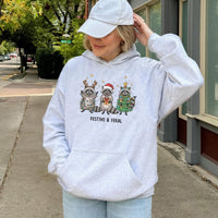 Humorous Christmas Animal Hoodie, Festive and Feral Raccoon Hoodie, Adorable Trash Panda Holiday Sweatshirt, Retro Raccoon Xmas Pullover Present