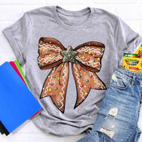 Adorable Holiday Gingerbread Tee, Christmas Gingerbread Bow T-Shirt, Retro Christmas Graphic Shirt, Festive Xmas Tee, Holiday Present for Women
