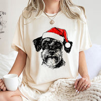 Santa Hat Dog T-Shirt, Schnauzer Christmas T-Shirt, Humorous Schnauzer Puppy T-Shirt, Adorable Holiday Dog Graphic Tee, Festive Dog Lover Present