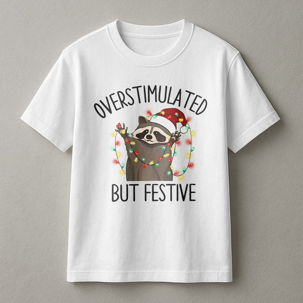 Humorous Holiday Animal Graphic Tee, Overstimulated but Festive Raccoon T-Shirt, Adorable Christmas Trash Panda Shirt, Introv