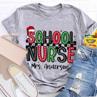 Custom Name Santa Hat Graphic Tee, Personalized School Nurse Christmas Shirt, RN Nurse Holiday T-Shirt, Healthcare Staff Xmas Present