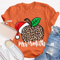 Custom Name Christmas T-Shirt, Personalized Leopard Santa Hat Shirt, Festive Holiday Graphic Tee, Comfy Xmas Present for Her, Adorable Top