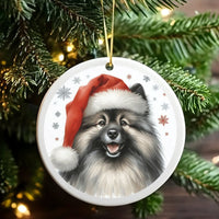 Santa Hat Keeshond Christmas Ornament, Keeshond Dog Ceramic Ornament, Adorable Dog Lover Holiday Decor, Festive Puppy Keepsake Tree Ornament
