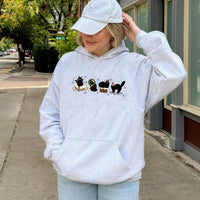 Festive Santa Kittens Holiday Sweatshirt, Christmas Black Cat Hoodie, Adorable Cat Mom Xmas Pullover, Comfy Spooky Furry Pet Lover Hooded Top
