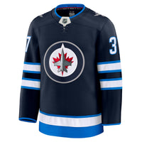 Winnipeg Jets Connor Hellebuyck Navy Home Premium Jersey