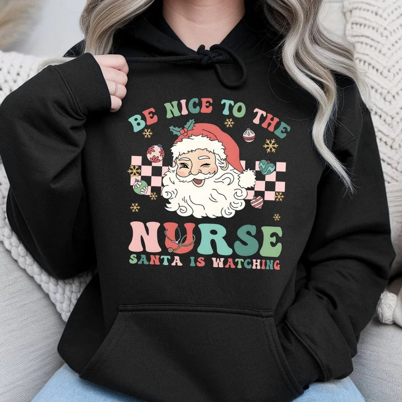 Be Nice to the Nurse Santa Is Watching Hoodie, Nurse Christmas Hoodie, Humorous RN Holiday Sweatshirt, Nurse Christmas Pullover Hoodie