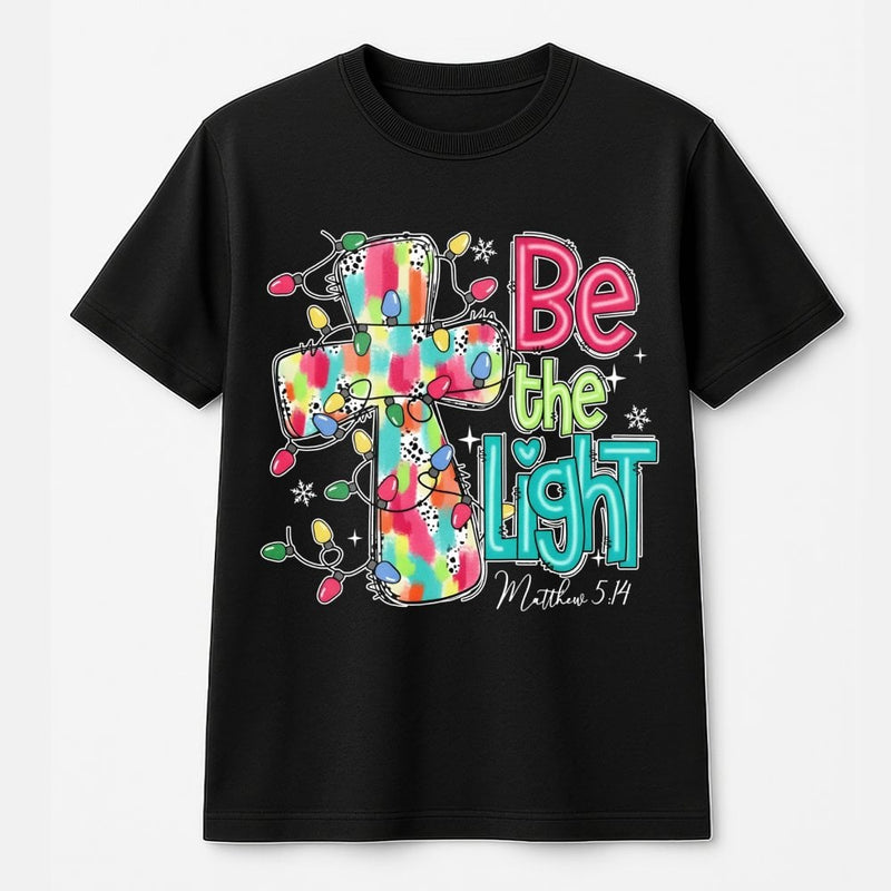 Christmas Cross T-Shirt, Be the Light Christian Shirt, Faith Inspired Holiday Tee, Bible Verse Graphic Shirt, Xmas Present for Women and Men